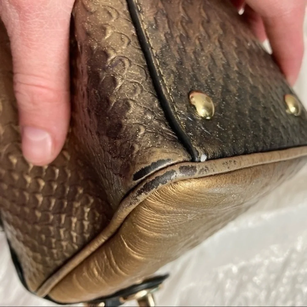 Coach gold embossed leather mini barrel bag